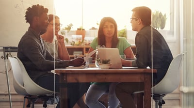 young diverse team of x having a candid discussion in conference room